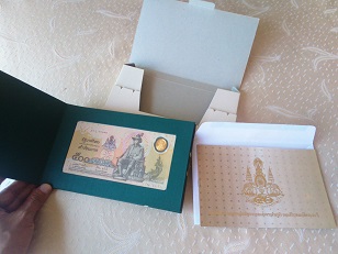 Set of banknote and silk folder